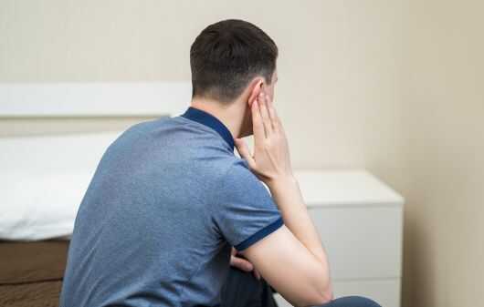 man-having-ear-pain
