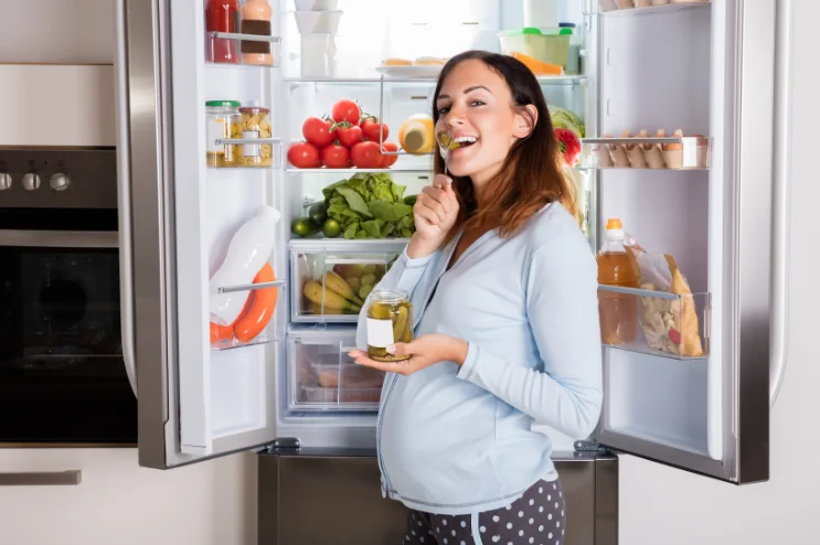 pregnant-women-eating-something