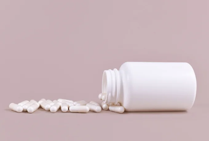 Pills Spilling from Bottle