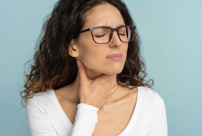 Sick Woman Having Sore Throat